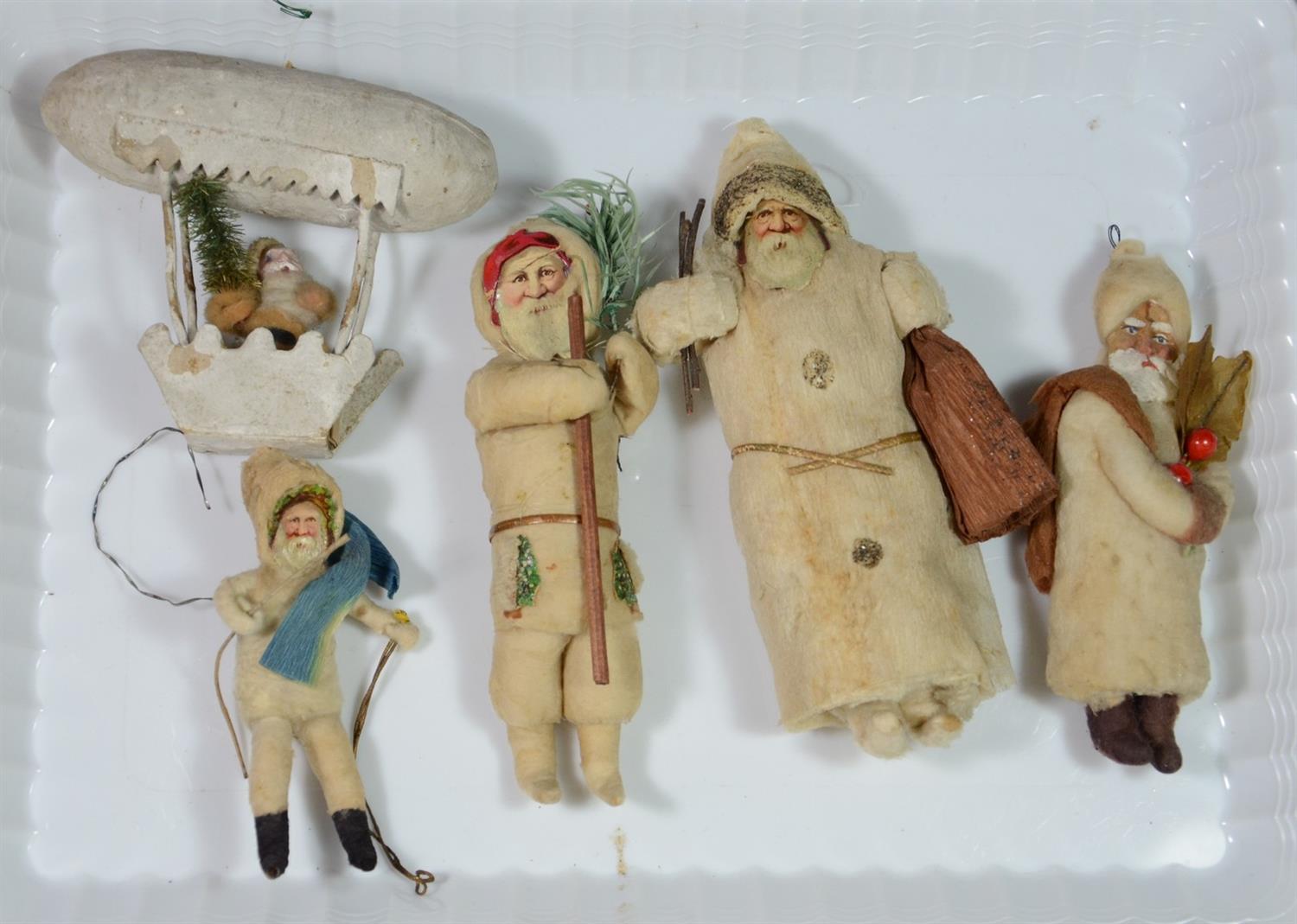 Appraisal: Cotton Santa ornaments including one in dirigible largest h RCA