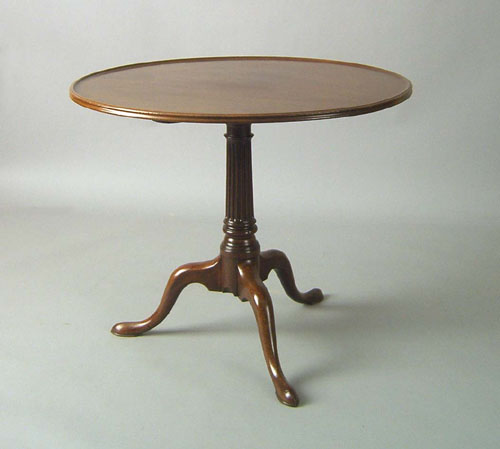 Appraisal: Chippendale mahogany tea table ca the circular top tilting above