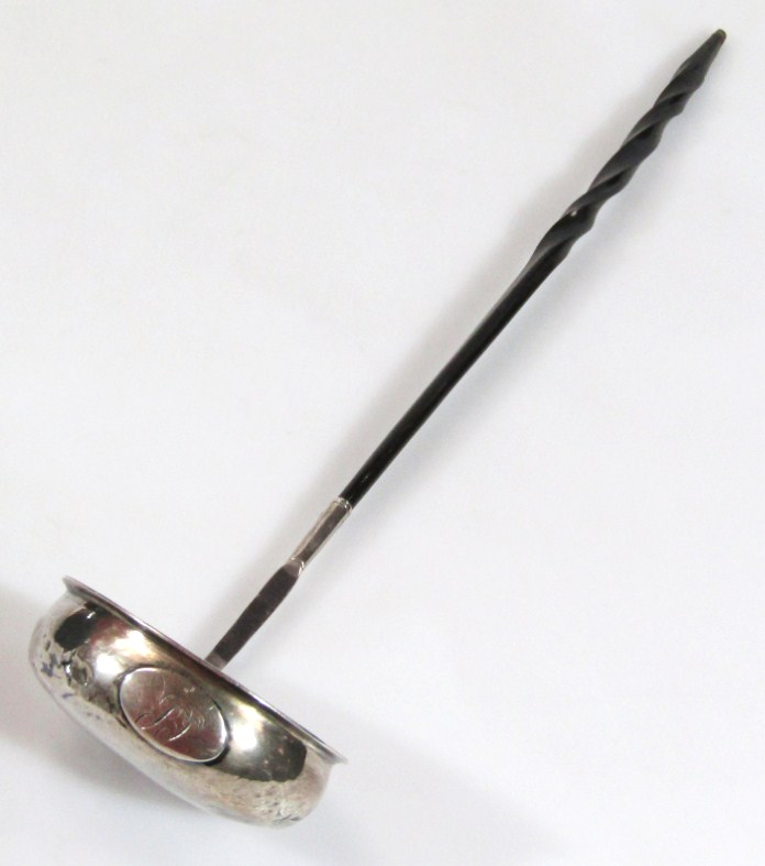 Appraisal: A George III silver toddy ladle with part turned whale