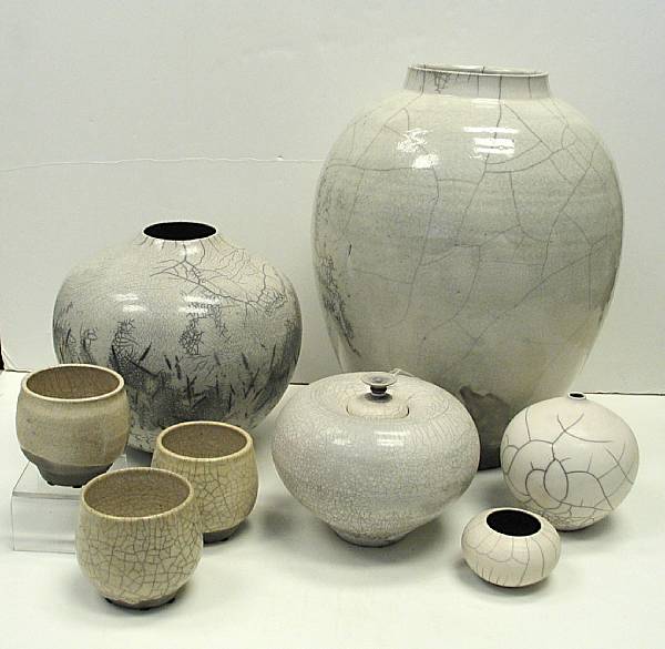 Appraisal: Eight art pottery vessels with craquelure glaze Comprising large ovoid