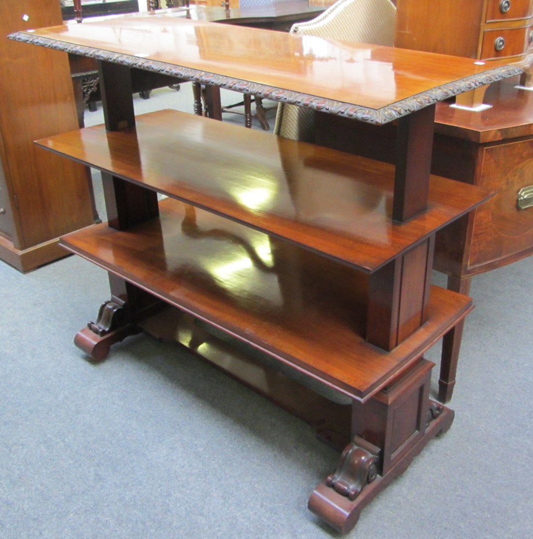 Appraisal: In the manner of Gillows a mahogany metamorphic three tier