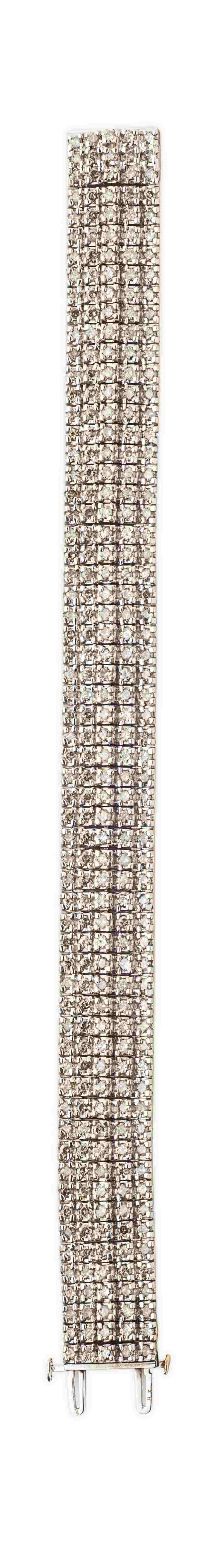 Appraisal: A modern diamond set bracelet modelled as a broad articulated