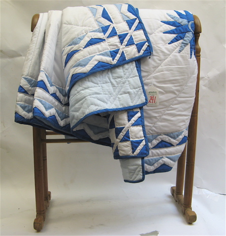 Appraisal: HAND MADE QUILT AND WOOD QUILT RACK The quilt with