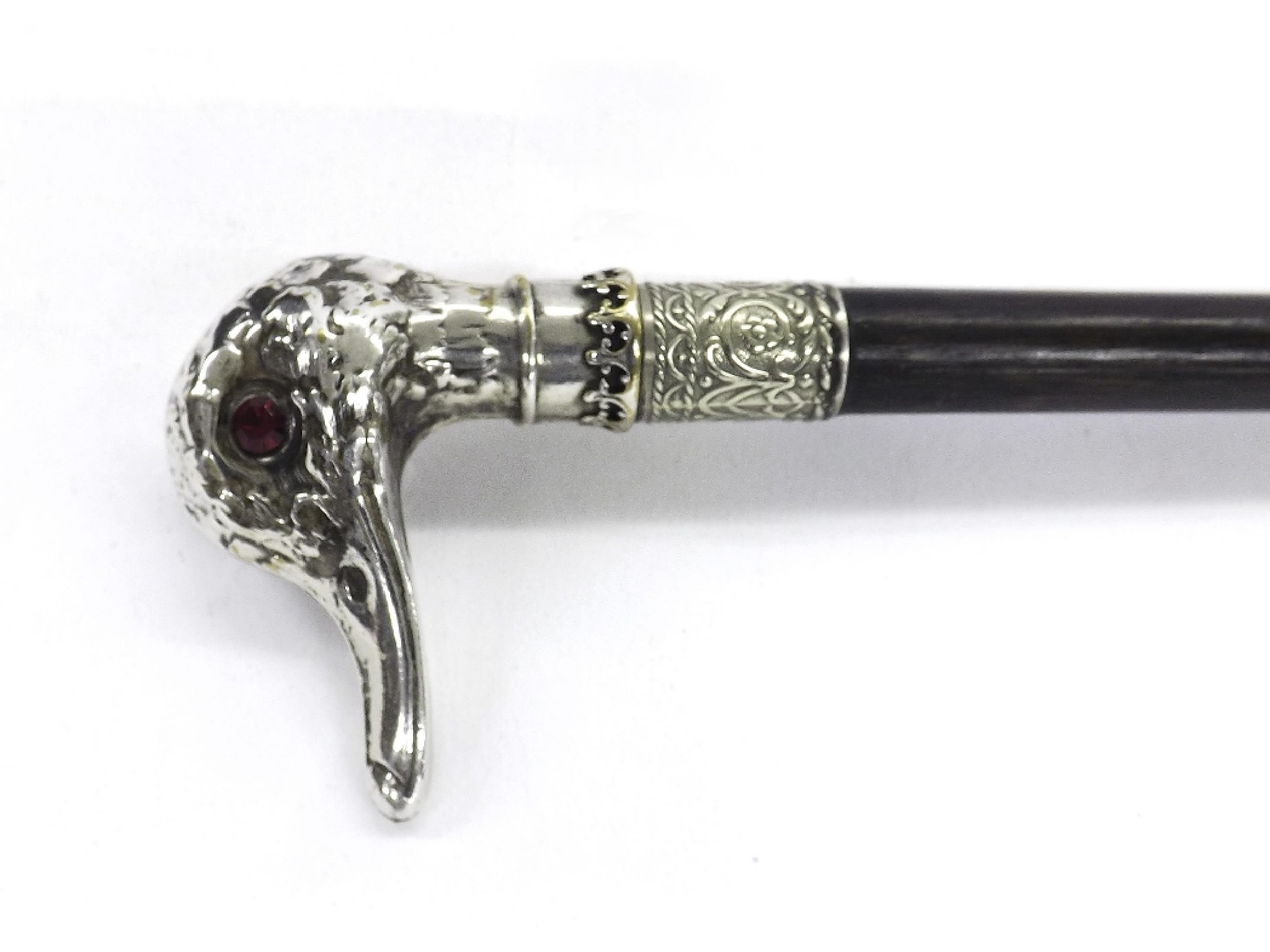 Appraisal: Lady's ebonised walking cane with white metal knop in the