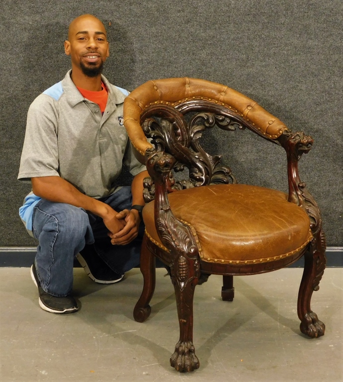 Appraisal: CONTINENTAL CARVED GARGOYLE WOOD LIBRARY ARM CHAIR th CenturyContinuous arm