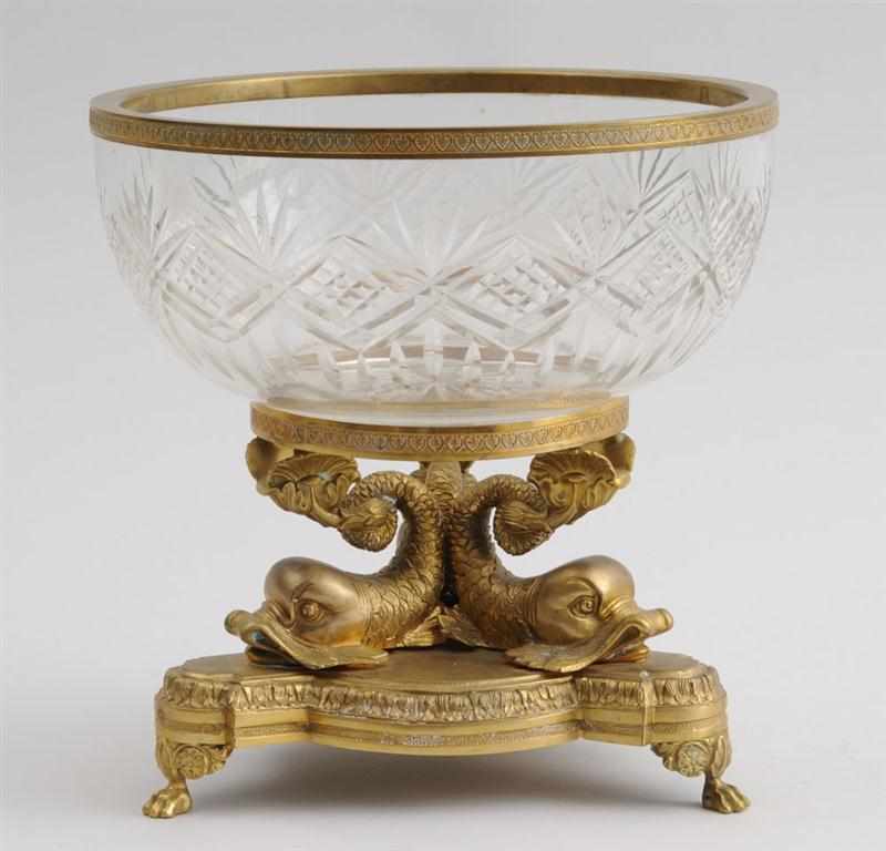 Appraisal: EMPIRE STYLE GILT METAL MOUNTED CUT-GLASS BOWL ON DOLPHIN STAND