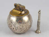 Appraisal: A silver Witchball table cigarette lighter Richard Comyns London cm