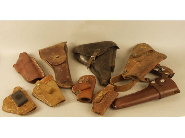 Appraisal: Box lot of miscellaneous holsters including a Luger holster with