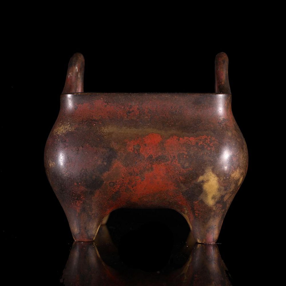 Appraisal: CHINESE BRONZE DING FOOTED HANDLED CENSER Chiinese bronze footed ding