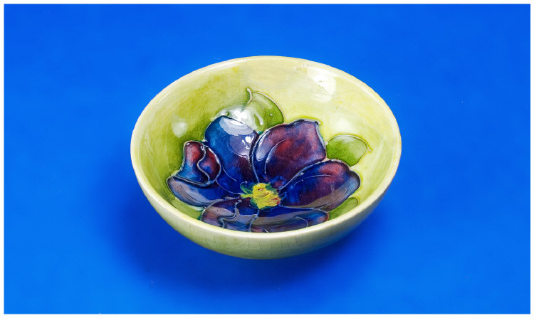 Appraisal: Moorcroft Small 'Clematis' Bowl Pale Green to Yellow Footed Bowl