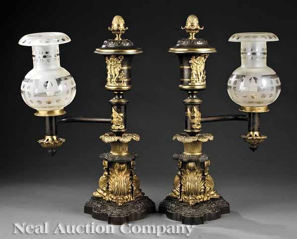 Appraisal: A Pair of English Gilt and Patinated Bronze Argand Lamps