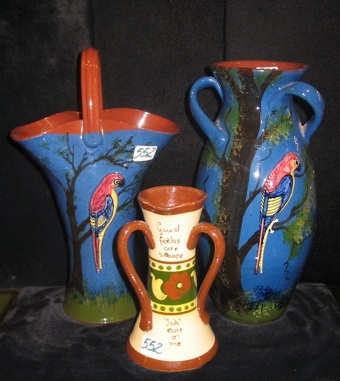 Appraisal: THREE ENGLISH ART POTTERY ITEMS Two are glazed vases by