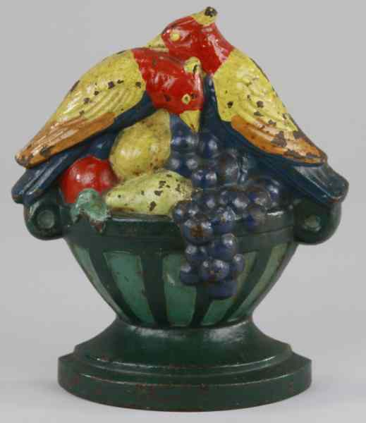 Appraisal: FRUITS BIRDS DOORSTOP Marked ''COPR FRUITS AND BIRDS '' depicts