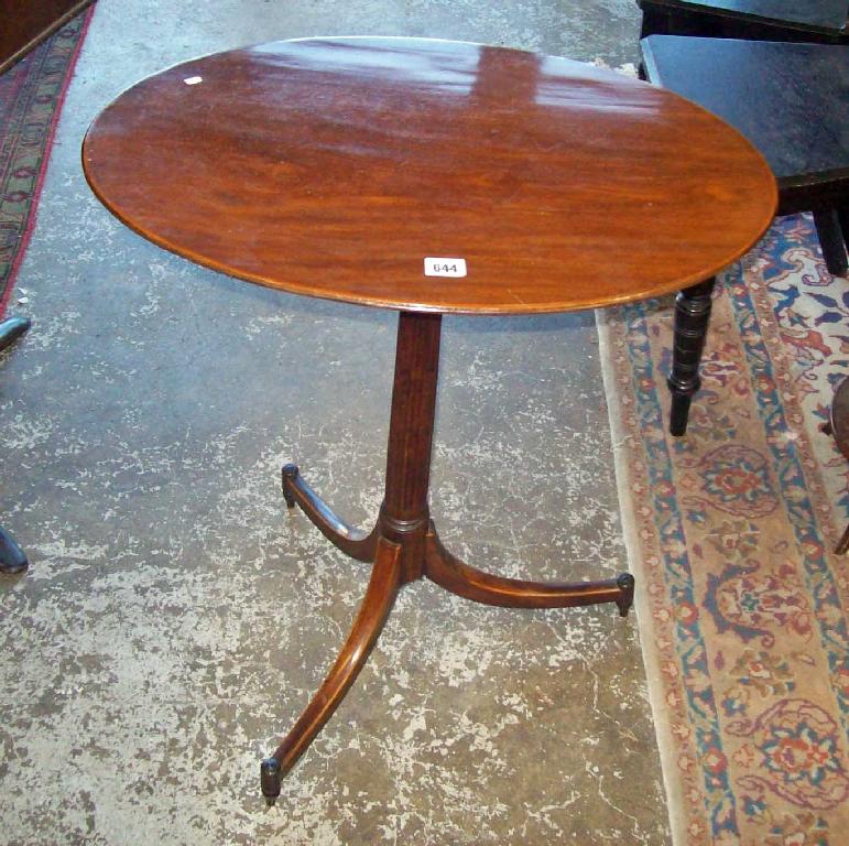 Appraisal: A George III mahogany tripod table with reeded support -