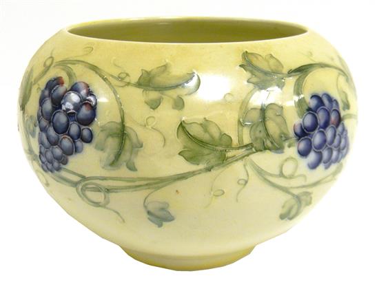 Appraisal: Moorcroft pottery bowl English th C blue grape and vine