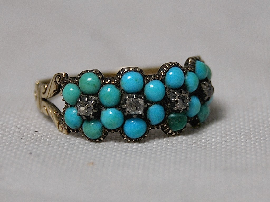 Appraisal: Victorian turquoise set flower ring with four small diamonds in