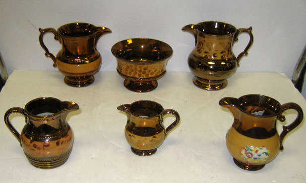 Appraisal: SIX ENGLISH COPPER LUSTRE WARE PIECES Five graduated in sizes