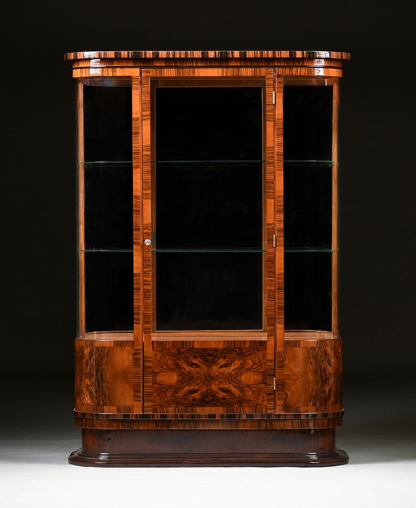 Appraisal: AN ART DECO ROSEWOOD AND FIGURED WALNUT GLAZED DISPLAY CABINET