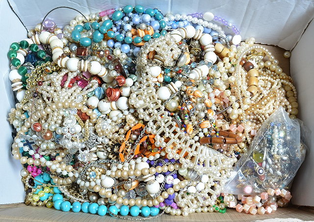 Appraisal: A box of miscellaneous costume jewelleryincluding mostly necklaces and beads