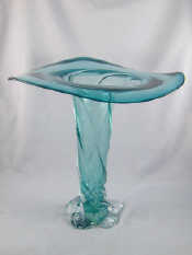 Appraisal: A large studio glass vase the pale green body swirling