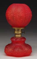 Appraisal: SCARCE RED SATIN MINI LAMP S - Red satin glass