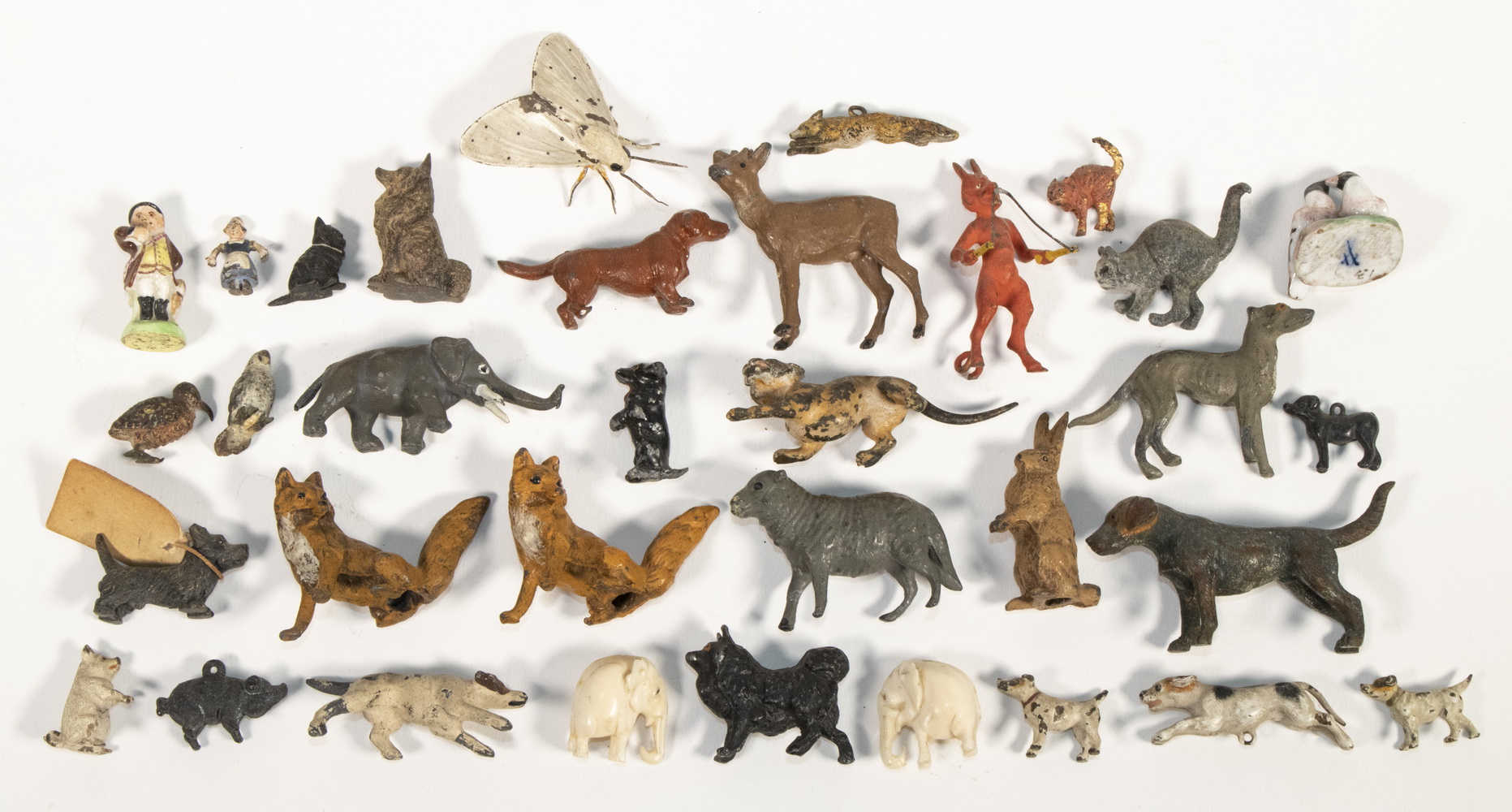 Appraisal: ASSORTED ANIMAL HUMAN FIGURES Collection of Miniature Vintage Figurines mostly