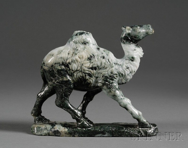 Appraisal: Jade Carving of a Camel th century dark green stone