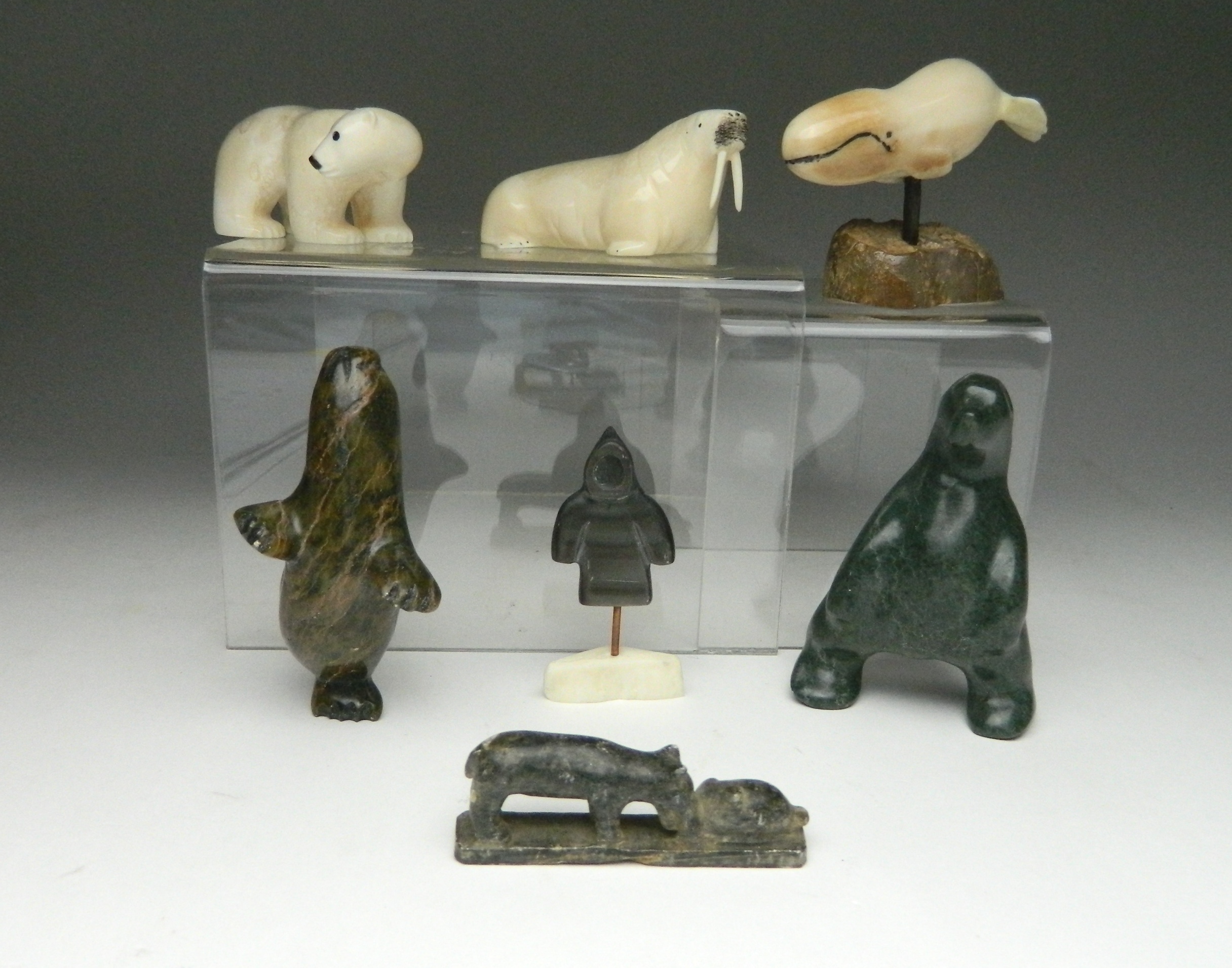 Appraisal: Inuit carvings K A - Bear Eating Seal- stone initialed