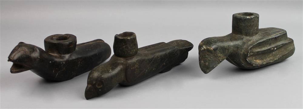 Appraisal: THREE STONE ANIMAL EFFIGY PIPES th C reproductions one in