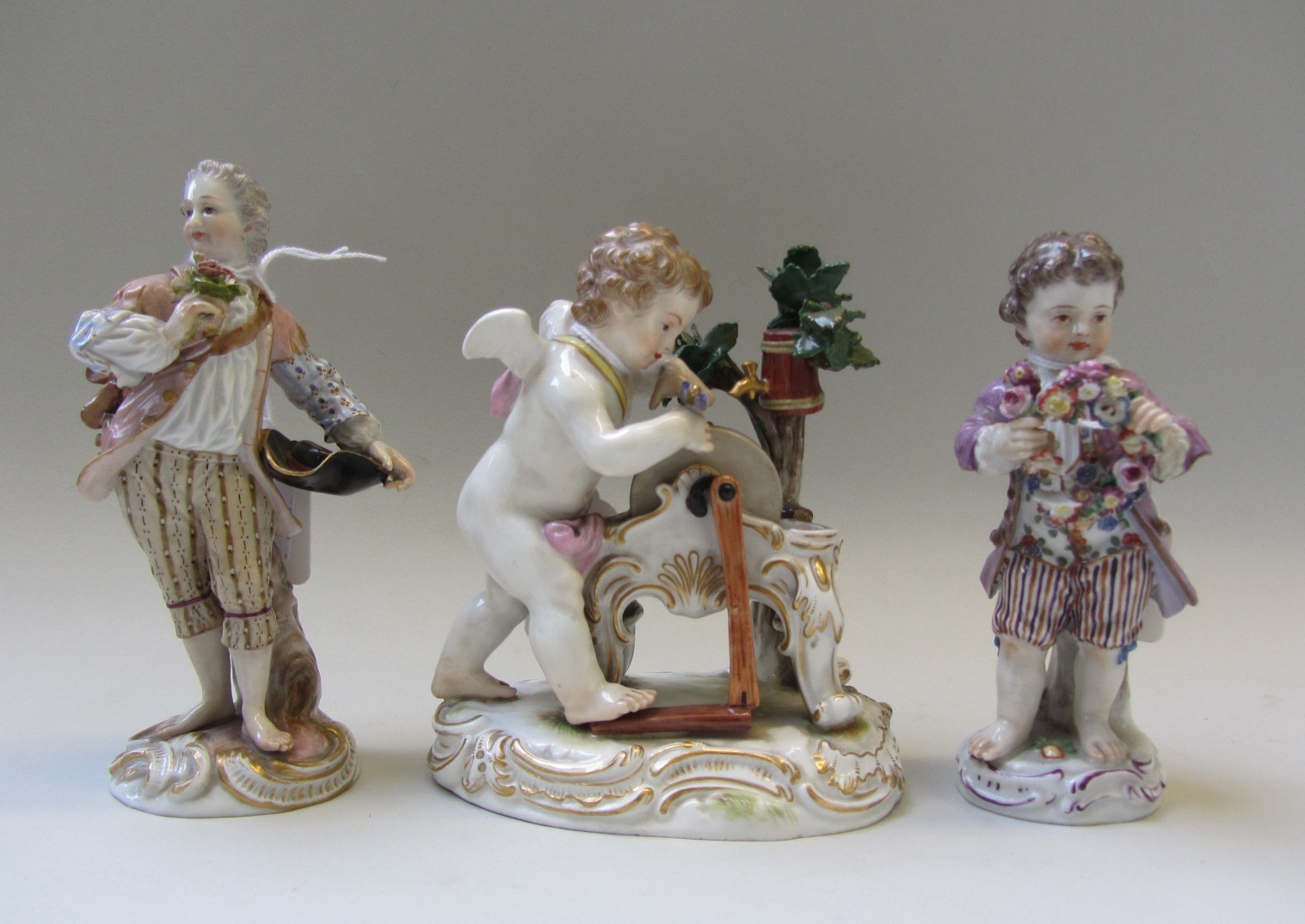 Appraisal: Three Meissen figures late th century early th century blue