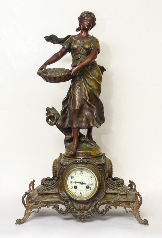 Appraisal: FRENCH SPELTER FIGURAL FEMALE MANTLE CLOCK Patinated spelter figural maiden