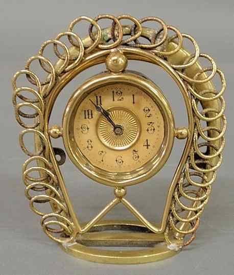 Appraisal: Brass saddle stirrup clock marked Patented June June 'h x