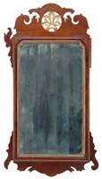 Appraisal: CARVED CHIPPENDALE MAHOGANY MIRROR Top crest having a pierced and