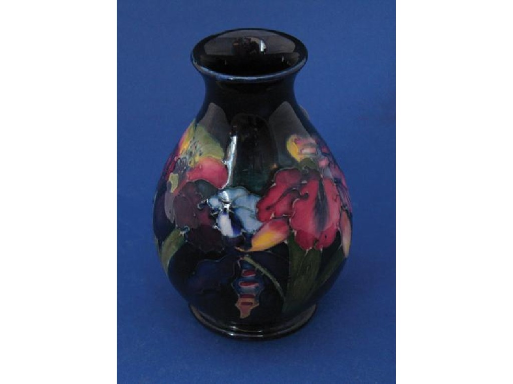 Appraisal: A MOORCROFT VASE of baluster form decorated with the orchid