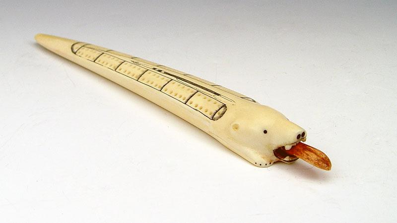 Appraisal: ALASKAN IVORY CRIBBAGE BOARD In the form of a polar