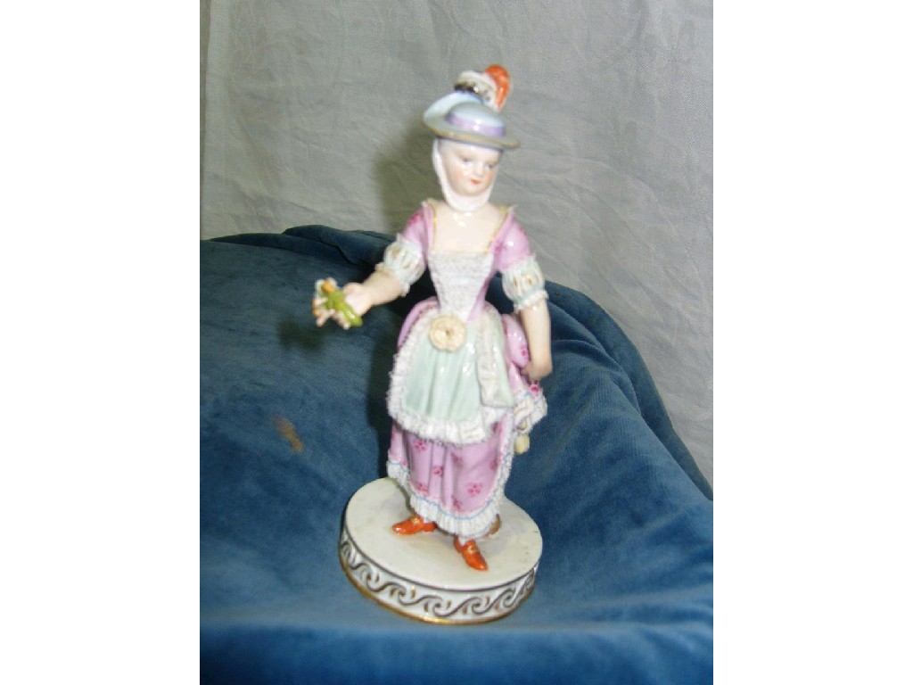 Appraisal: A late th century Meissen figure of a young woman