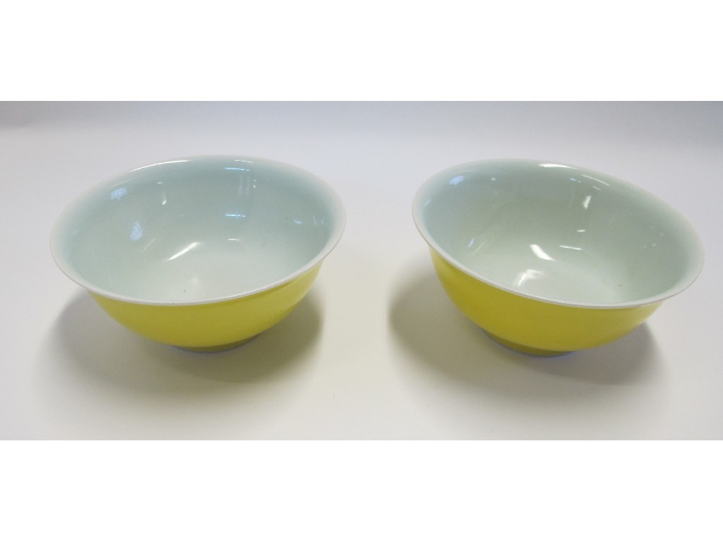 Appraisal: Two Chinese yellow glazed bowls