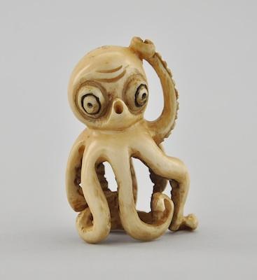 Appraisal: Octopus Ivory Netsuke A carved puzzled octopus with raised tentacle