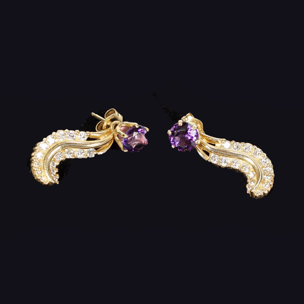 Appraisal: Gold K amethyst stud earrings with diamond feather enhancers Dwt