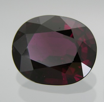 Appraisal: An Unset Unusually Large Oval Grape Rhodolite Garnet Weighting Carat