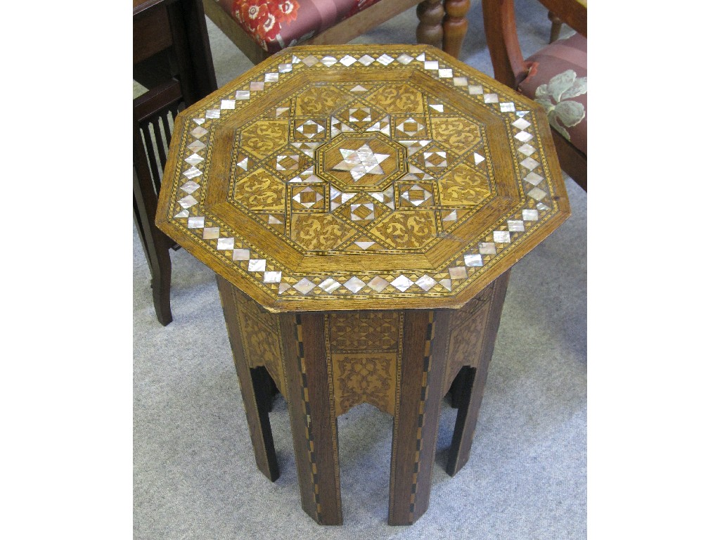 Appraisal: Eastern oak parquetry and mother of pearl inlaid occasional table