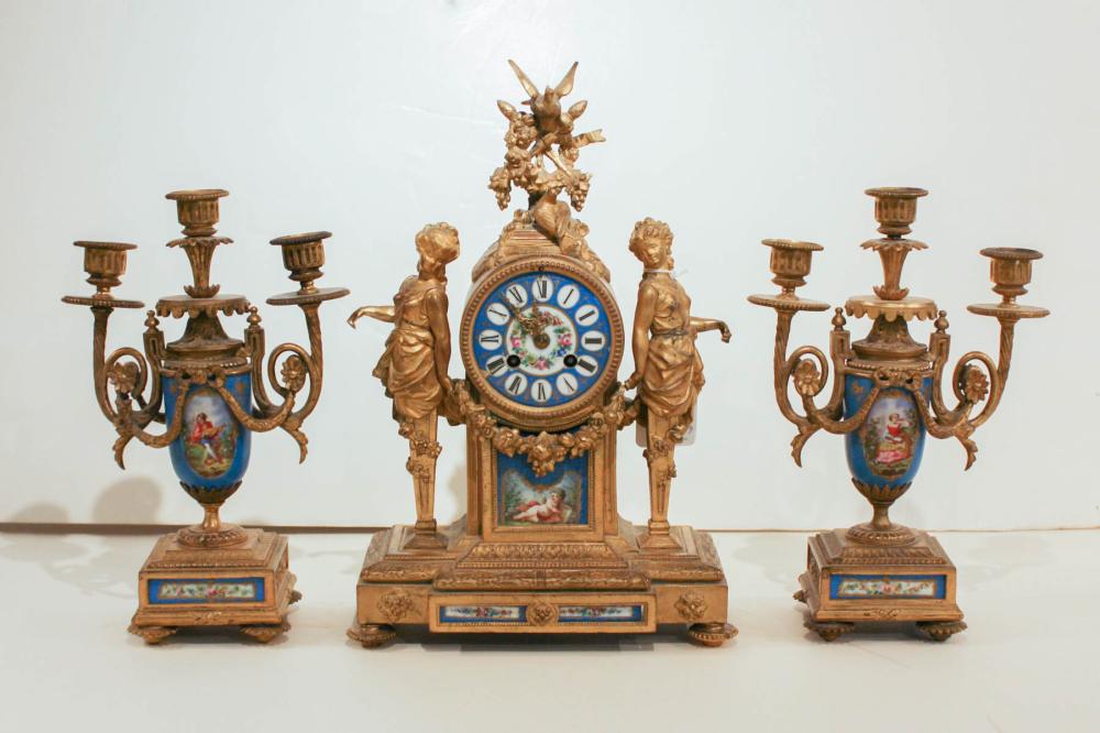 Appraisal: THREE-PIECE PORCELAIN AND GILT-BRONZE CLOCK SET Japy Freres Cie movement