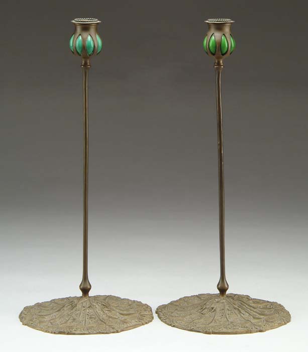 Appraisal: PAIR OF QUEENS LACE CANDLESTICKS Nice bronze candlesticks have wide