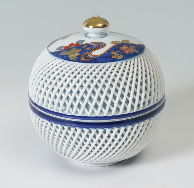 Appraisal: JAPANESE IMARI RETICULATED COVERED JAR Signed Hirado top with Imari