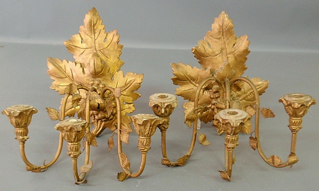 Appraisal: - Pair of Italian carved gilt grape form three-arm sconces