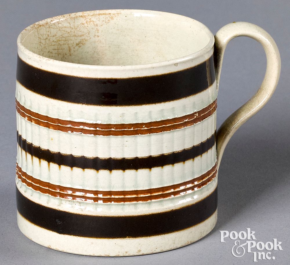 Appraisal: Mocha mug Mocha mug with ribbed body and brown and