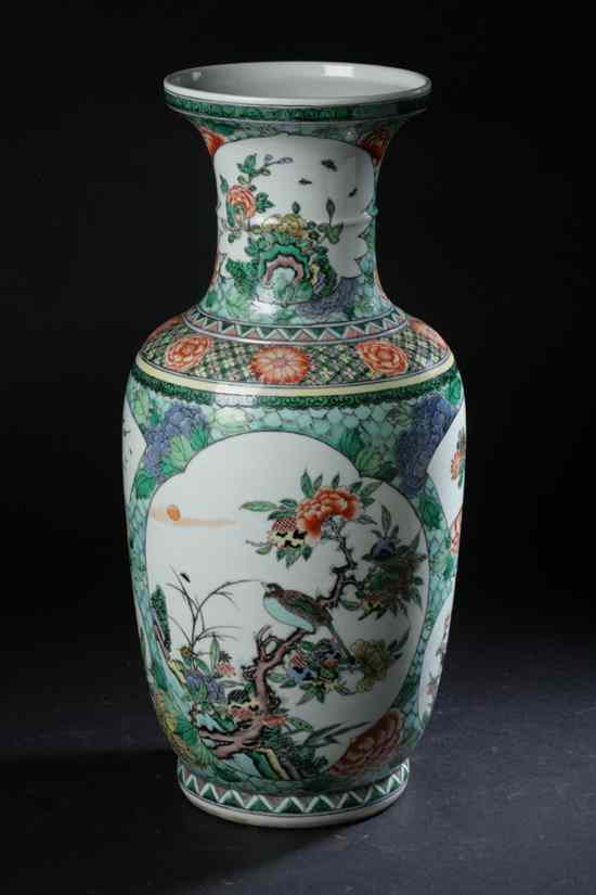 Appraisal: CHINESE FAMILLE VERTE BALUSTER-FORM PORCELAIN VASE Decorated with vignettes of