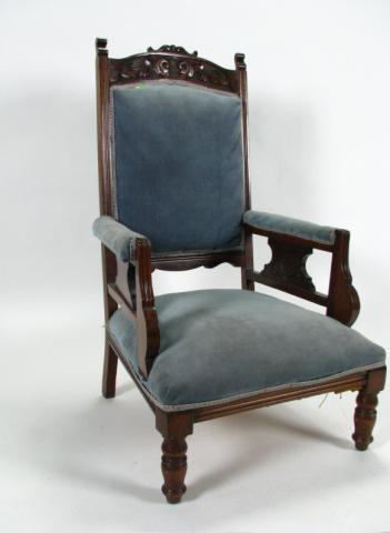 Appraisal: Antique carved walnut arm chair upholstered padded seat back and