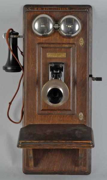 Appraisal: Western Electric Picture Frame Wall Telephone Description Circa Oak with