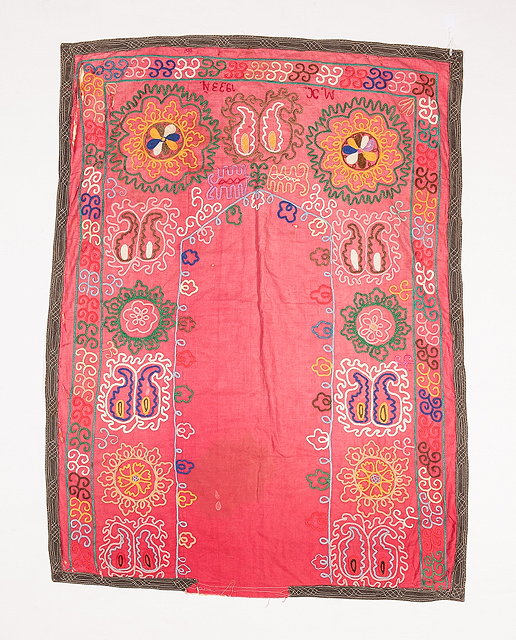 Appraisal: AN UZBEK SUZANI PRAYER MAT with polychrome gul decoration inscribed